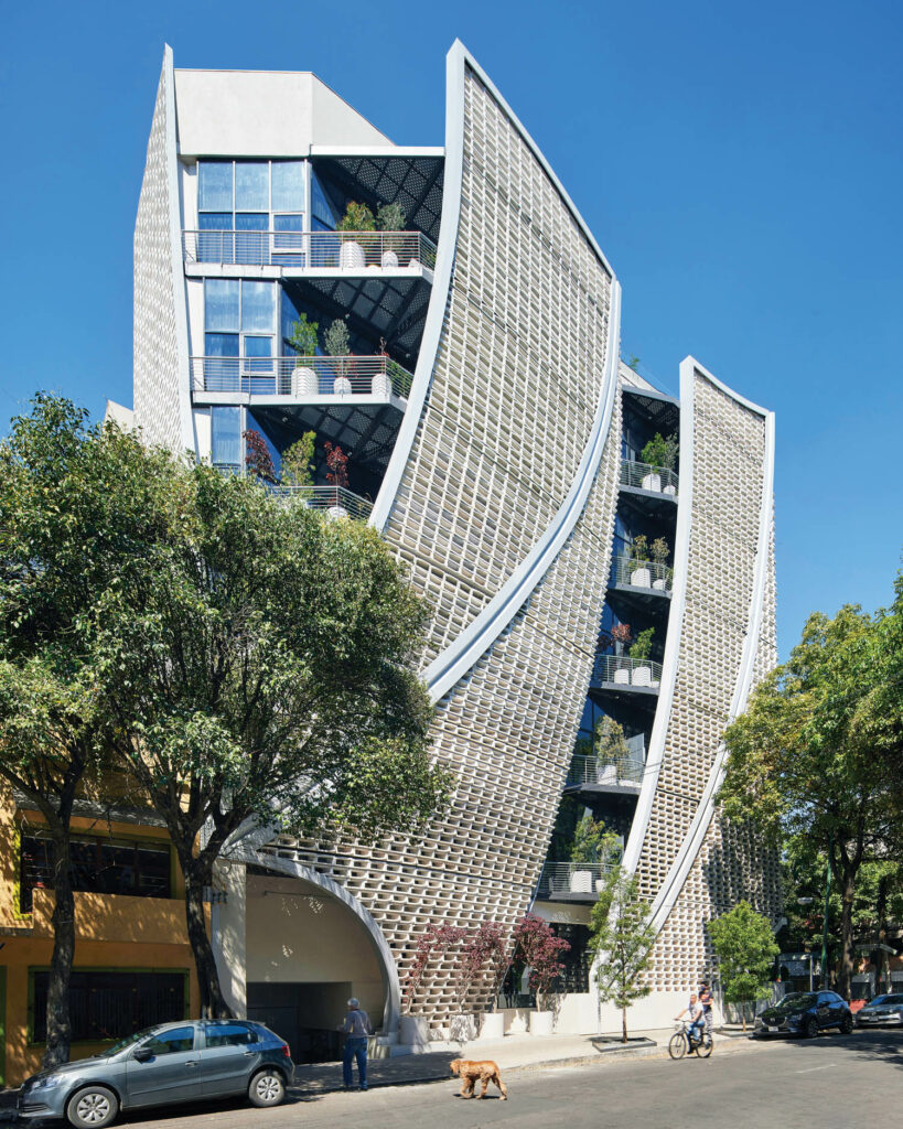 a twisting exterior of an apartment-style boutique hotel