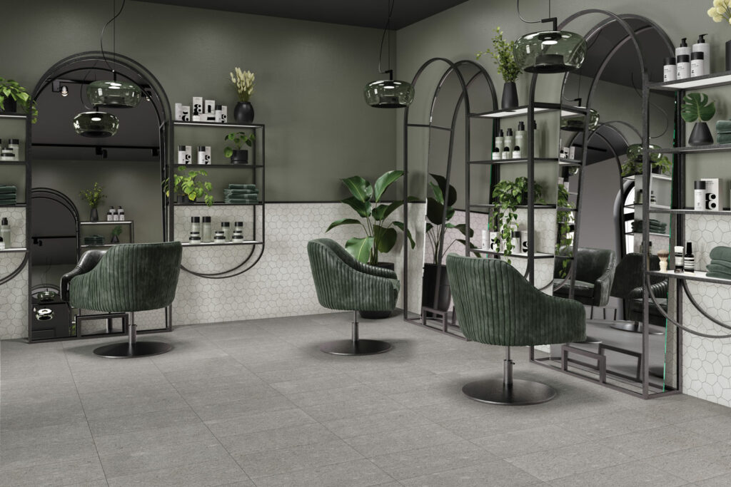 a hair salon with green furnishings and accents