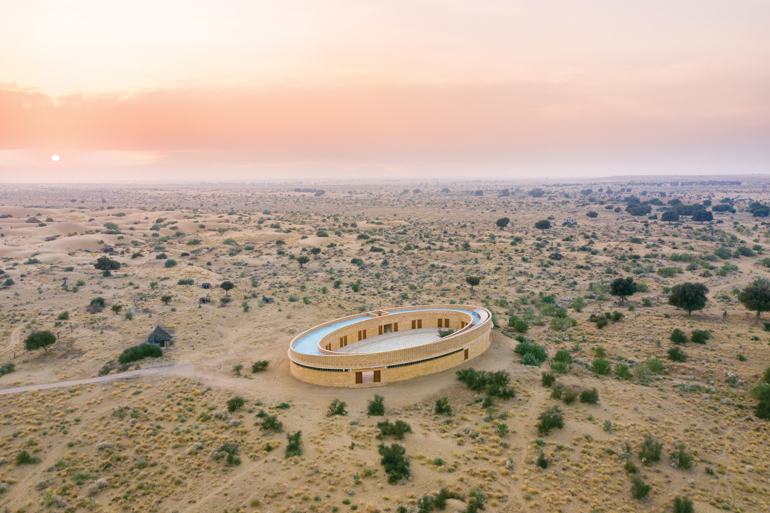 The oval shape of the Rajkumari Ratnavati Girls’ School stands alone in the desert landscape