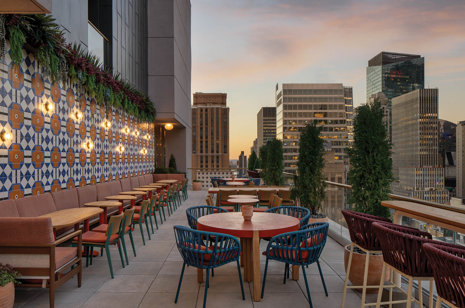 the rooftop patio of Harta at the Grayson Hotel decorated with jewel tones