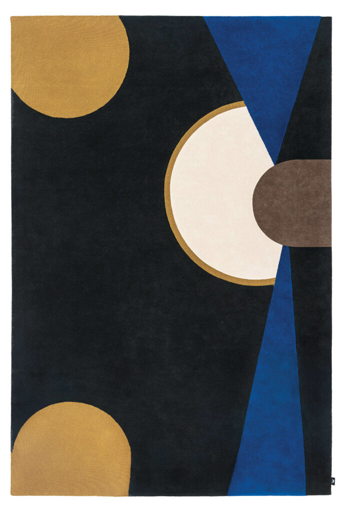 a rug with an abstract pattern of yellow circles and blue triangles
