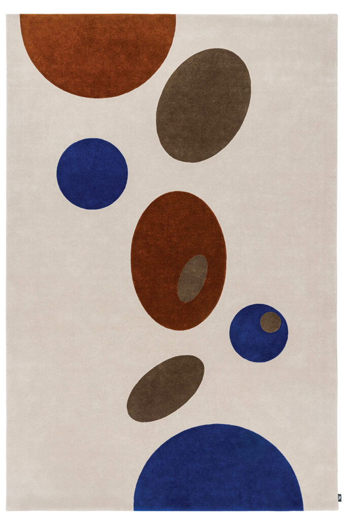 an abstract rug with a pattern of ovals and circles