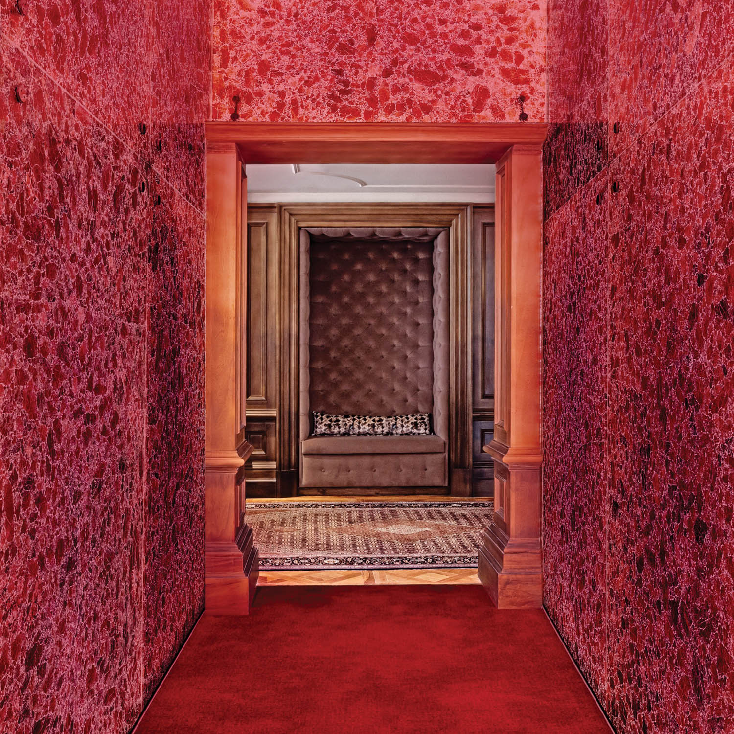 the red walled and floored entrance to Virgin Hotels Edinburgh