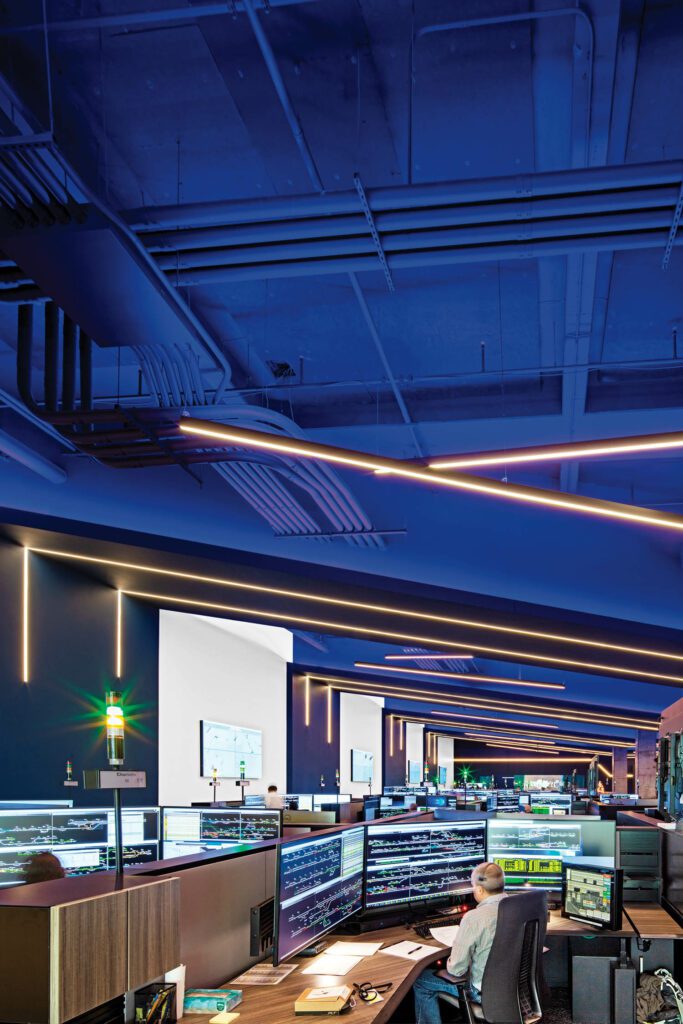 LED pendant and recessed linear fixtures in the network operations center.