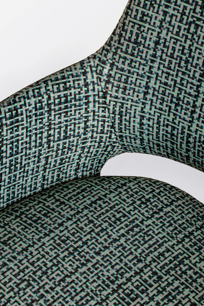 a green upholstered chair