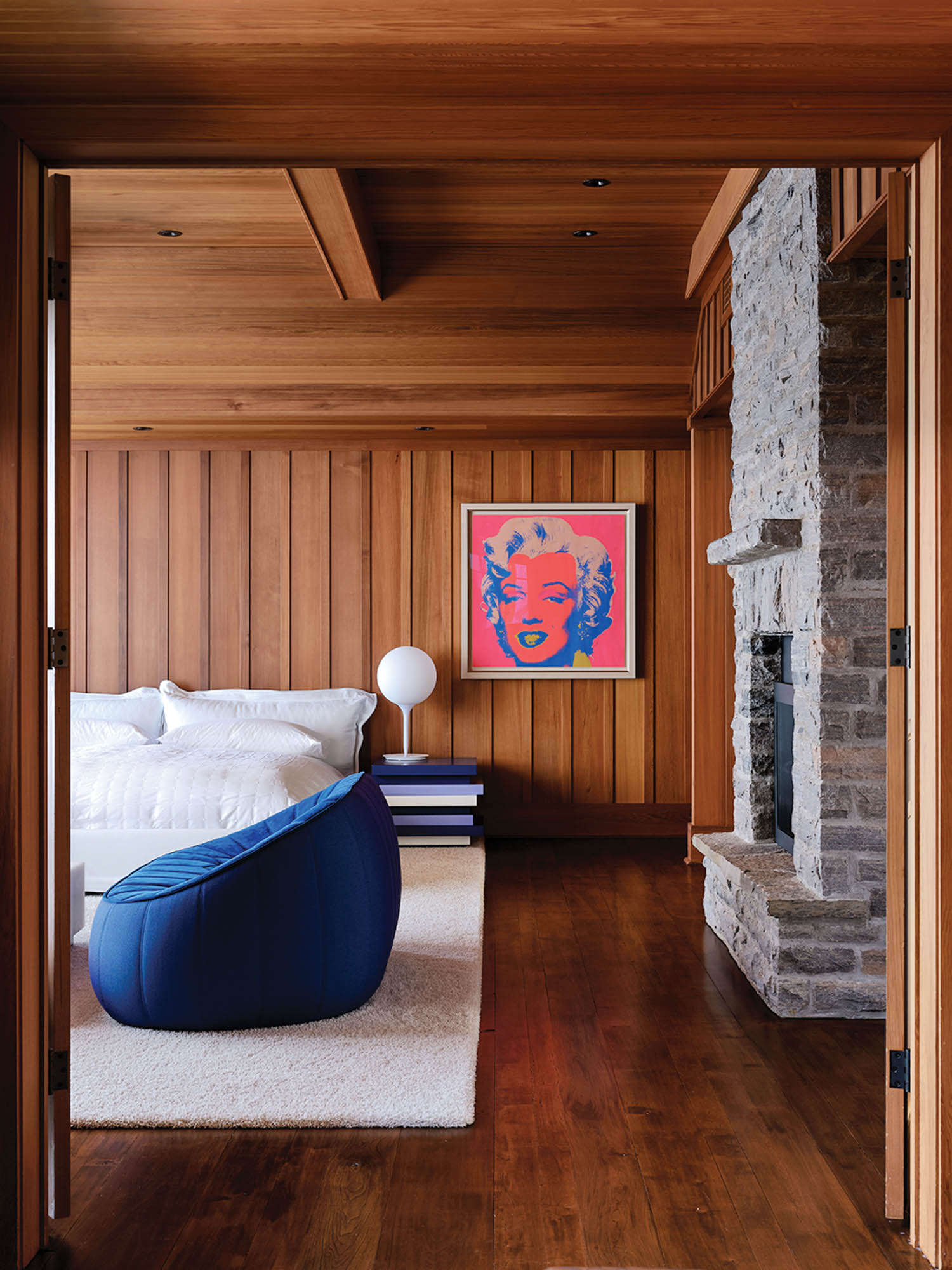 a graphic print of Marilyn Monroe in the family room of a cottage