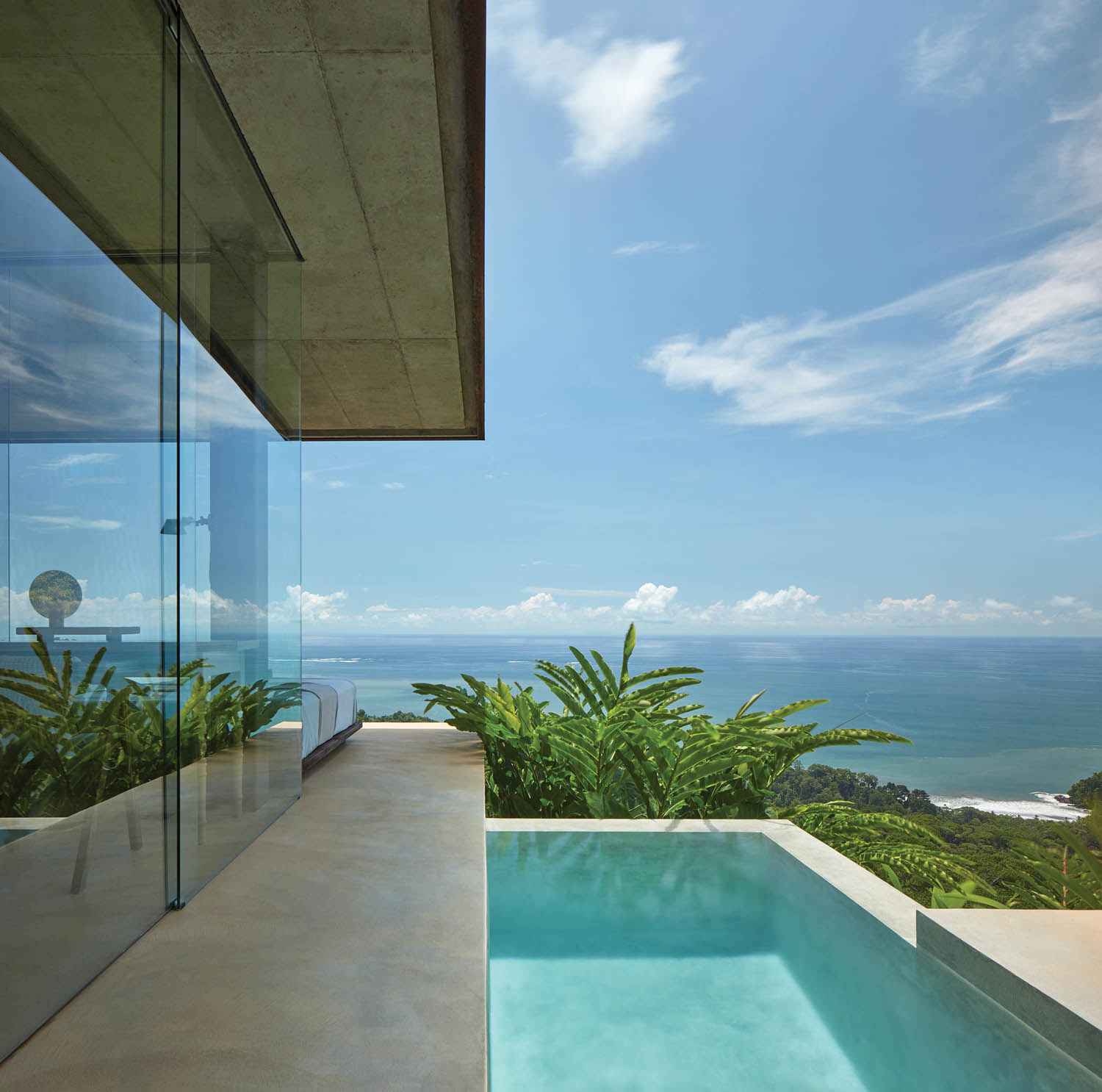 a pool on a rental villa with views of the Pacific Ocean