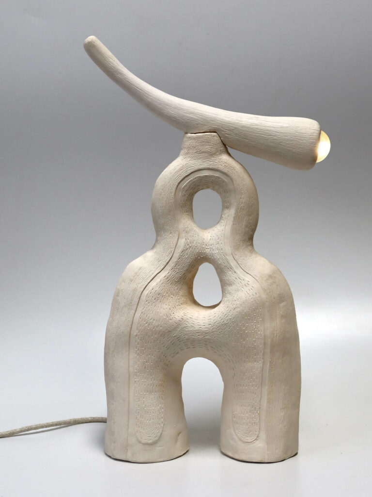 a ceramic lamp with an amorphous shape by Jan Ernst