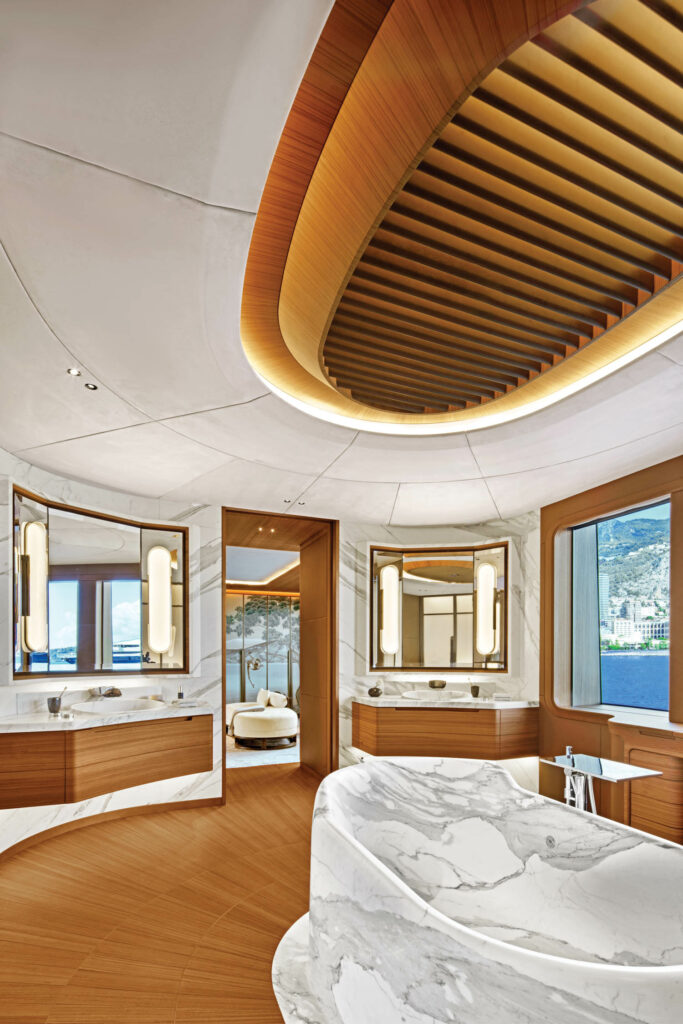 a marble tub inside a bathroom of a luxury yacht