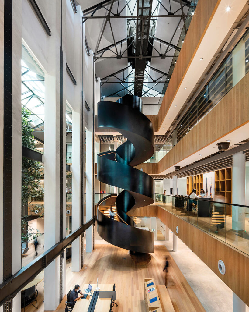a black winding staircase in Dyson's Singapore headquarters