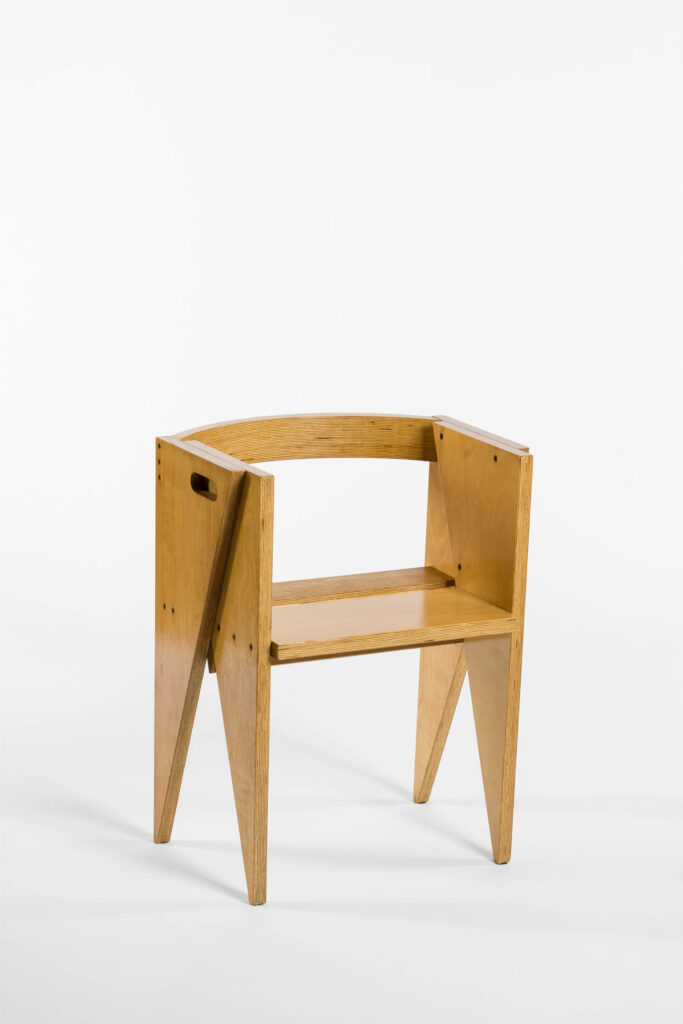 a chair with triangular legs