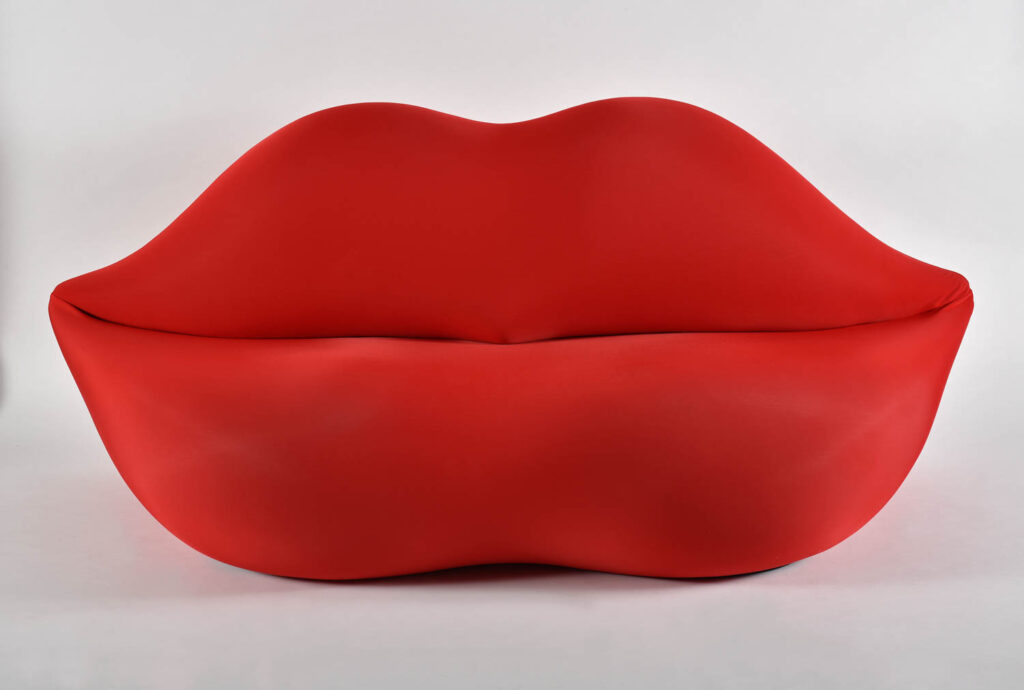 a sofa shaped like a pair of red lips
