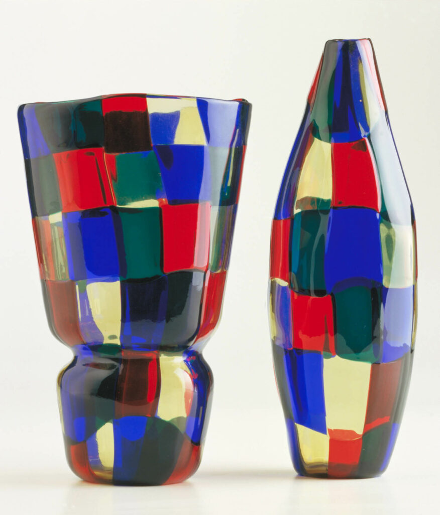 two vases painted with squares in primary colors