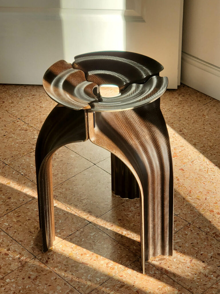 a stool inspired by Gothic architecture