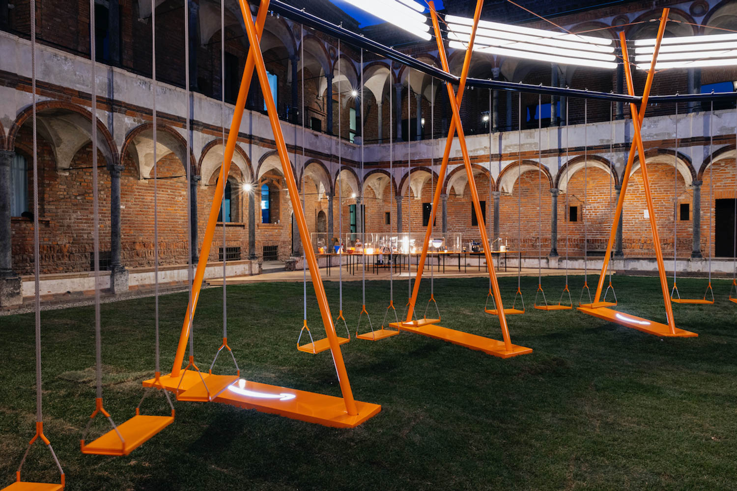 an oversized swing set at the University of Milan