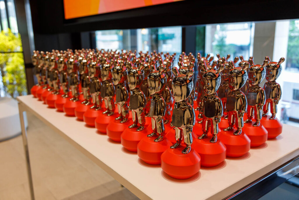 rows of Lladro Guest statuettes at NYCxDESIGN Awards