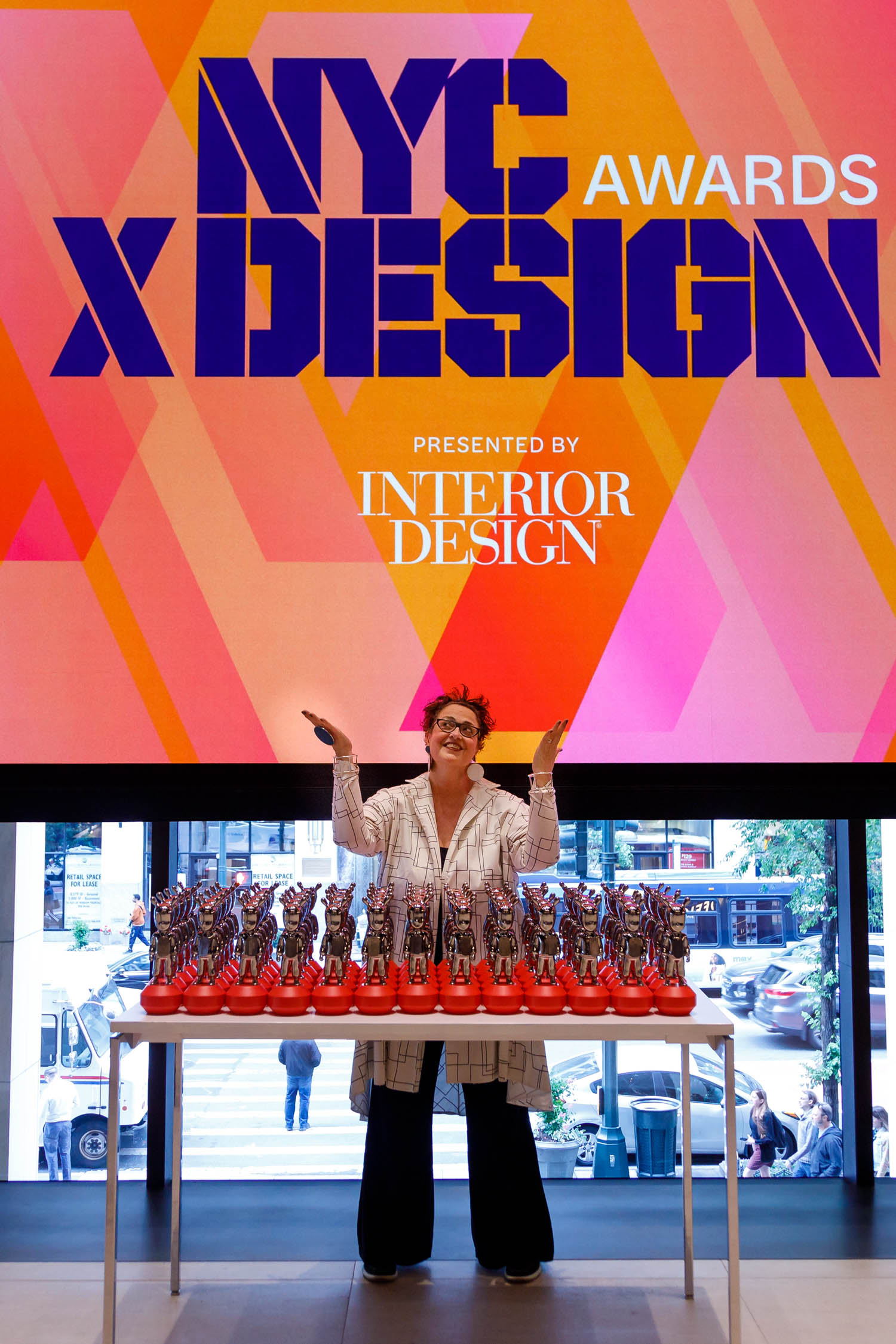 Cindy Allen with the winners' trophies at the NYCxDESIGN Awards ceremony 2023