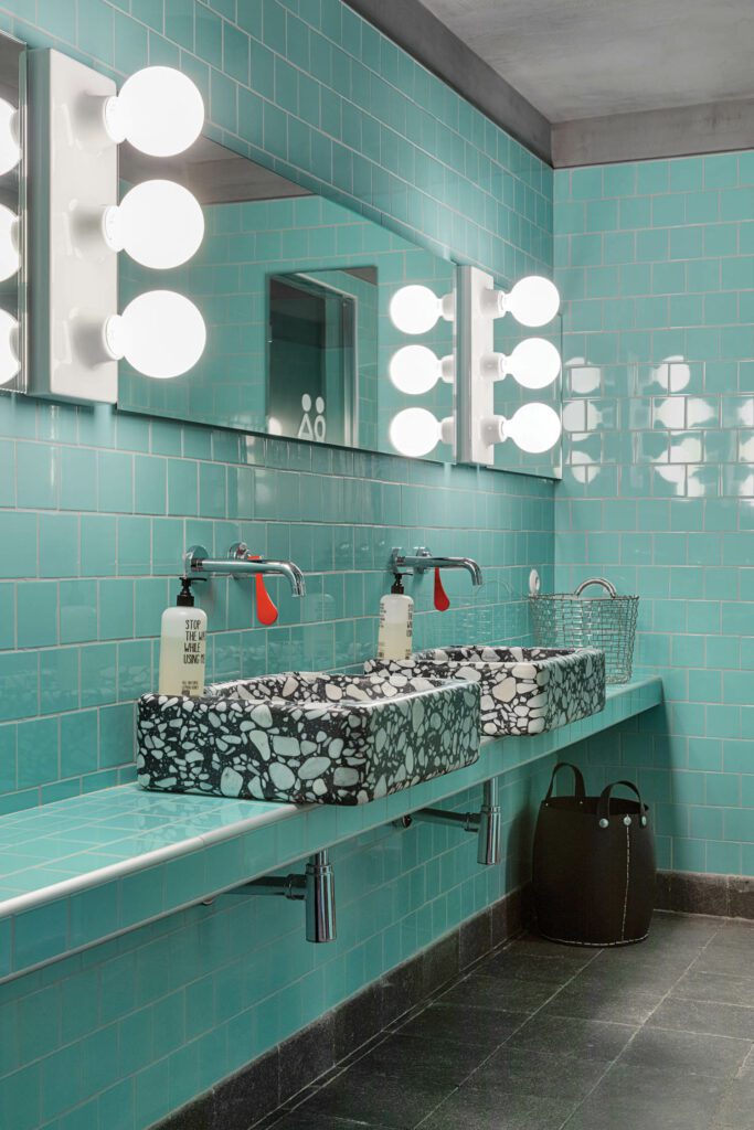 She also designed the faucets and sconces in the sauna restroom, with custom marble sinks.