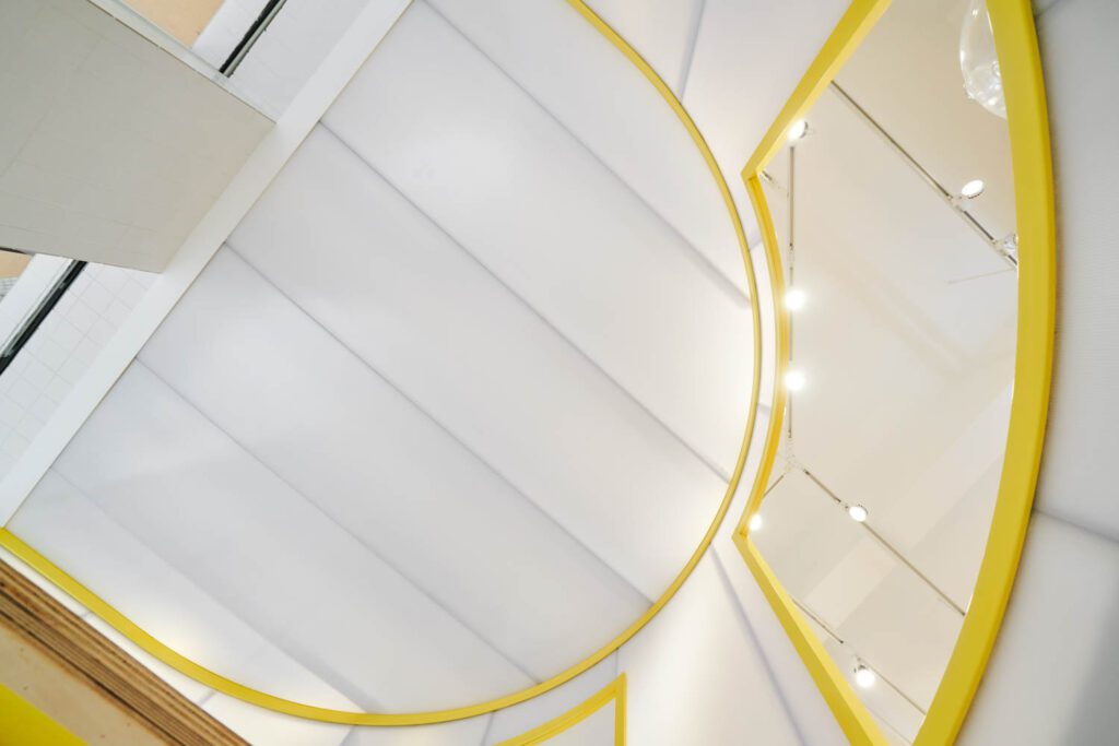 Yellow borders define the contours, from floor to ceiling.