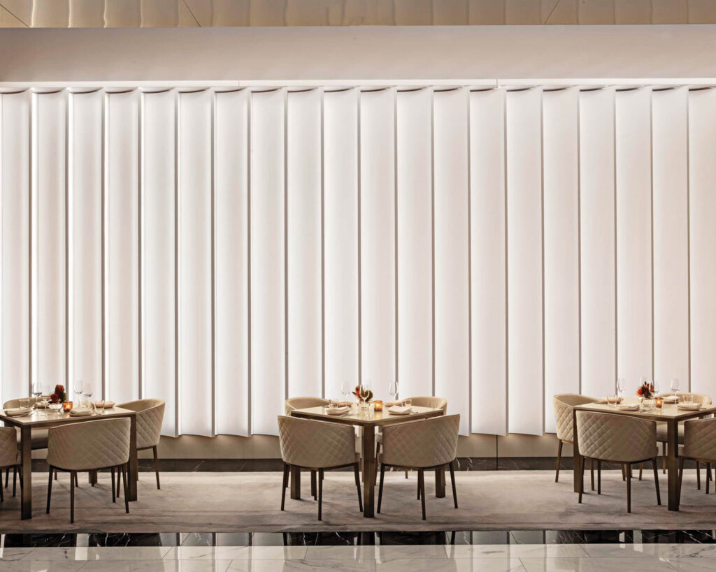 a neutral-palette dining area in a Four Seasons hotel restaurant 