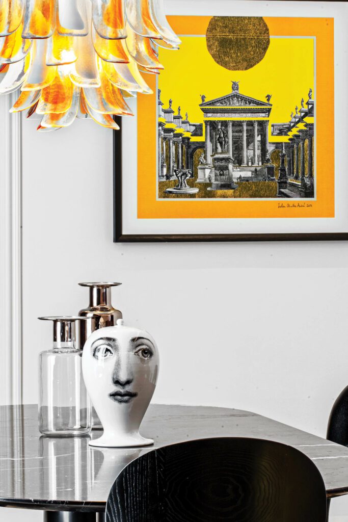 A Fornasetti vase and custom pendant fixture in the presidential suite. 