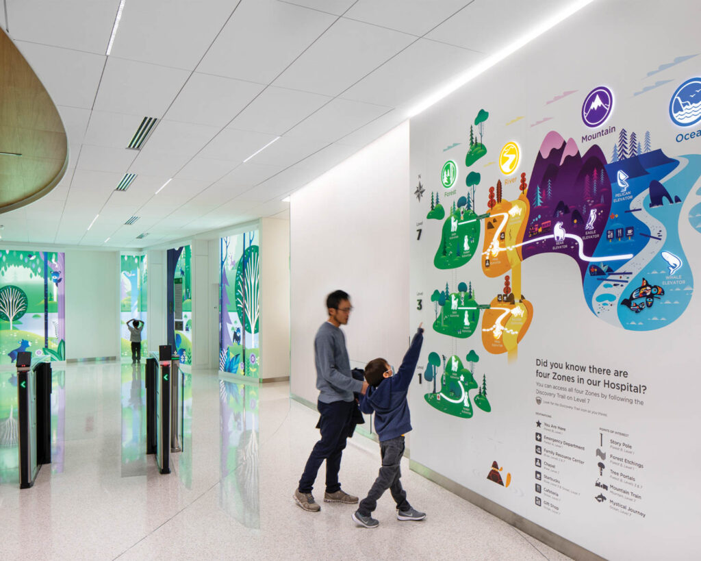 Wall murals double as learning tools in Children follow storybook wayfinding images in Building Care, Seattle Children’s.